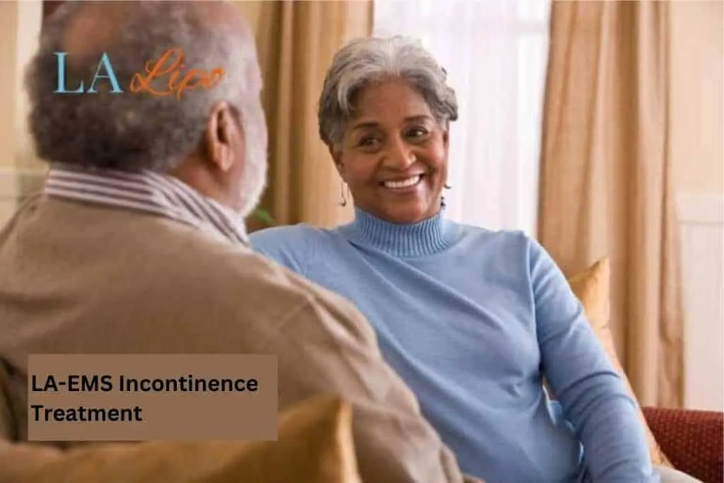 Couple sat smiling at each other - LA-EMS treatment Twickenham