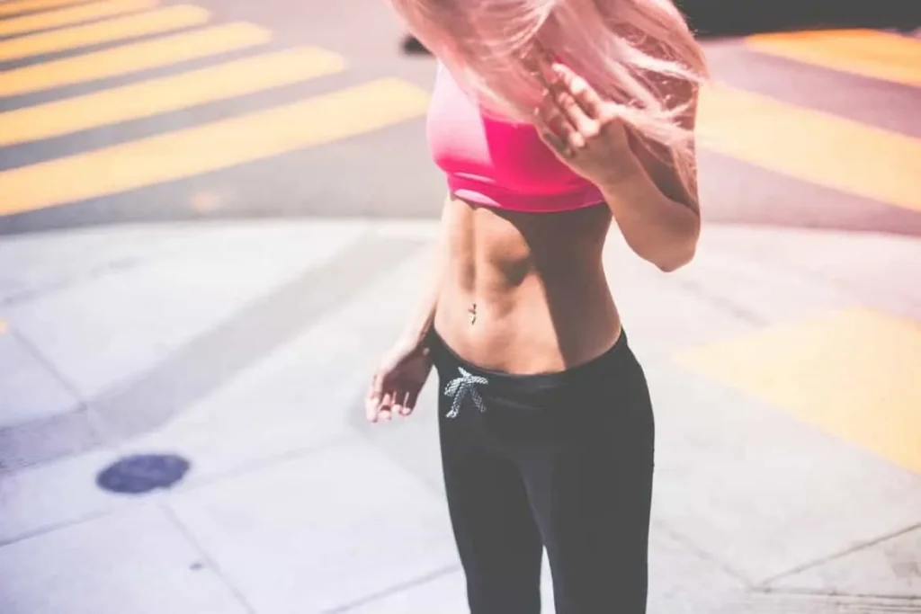 Woman with toned stomach after LA-EMS Body Sculpting Treatment Twickenham